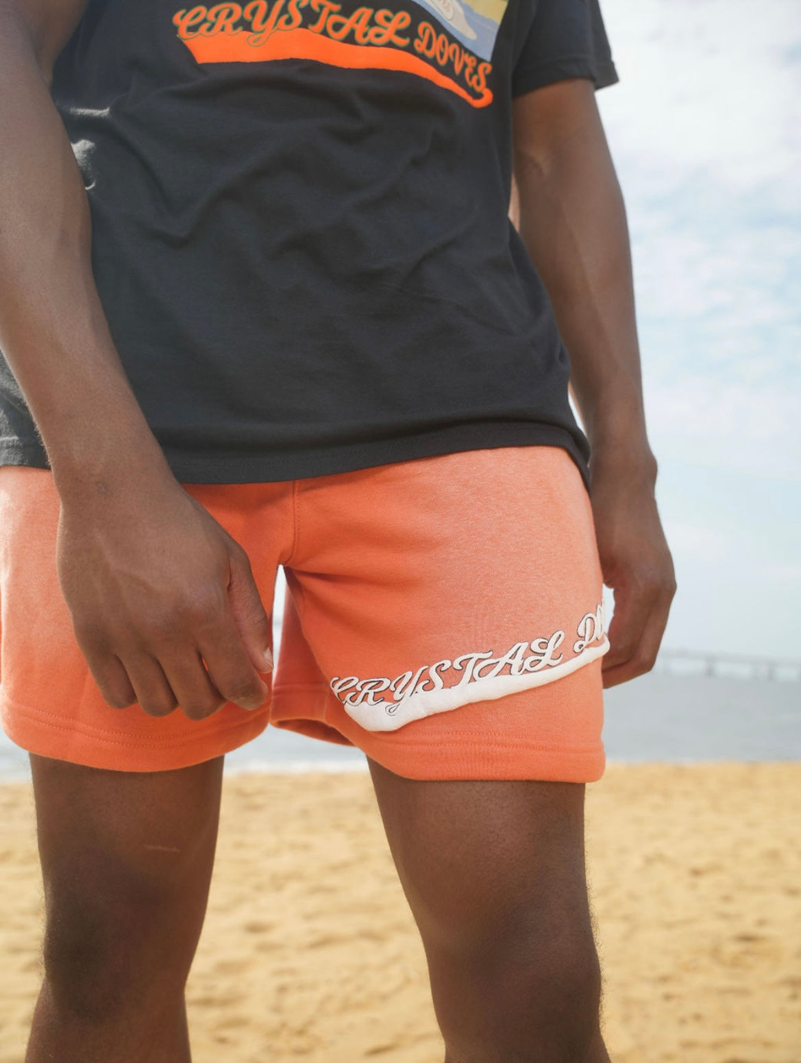 PUFF PRINT ACID WASHED SHORTS - PASTEL ORANGE